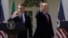 White House in Washington, U.S. - Brazil's President Jair Bolsonaro and U.S. President Donald Trump / Brazil's President Jair Bolsonaro and U.S. President Donald Trump wave as they depart at the conclusion of a joint news conference in the Rose Garden of 