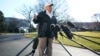 Donald Trump talks to reporters as he departs for a visit to the U.S. southern border area